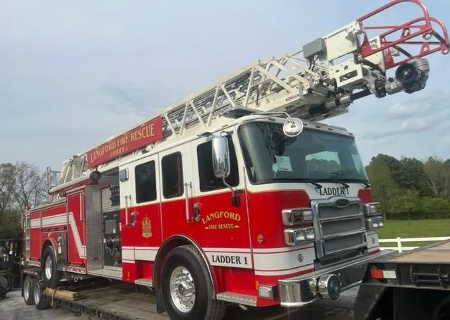 Photograph likely showing the new aerial ladder apparatus