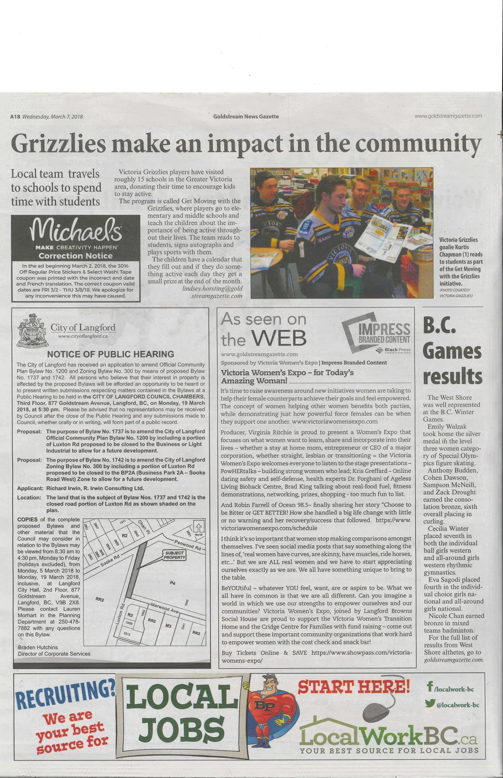 Photo — Victoria Grizzlies goalie Kurtis Chapman reads to students as part of the Get Moving with the Grizzlies initiative.