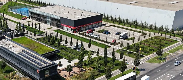 Industrial storage screened from public view.