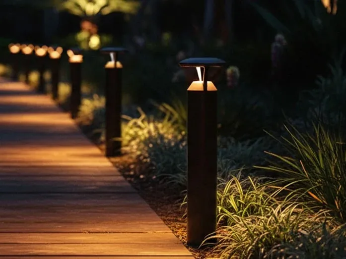 Shielded pathway lighting directing light downward.