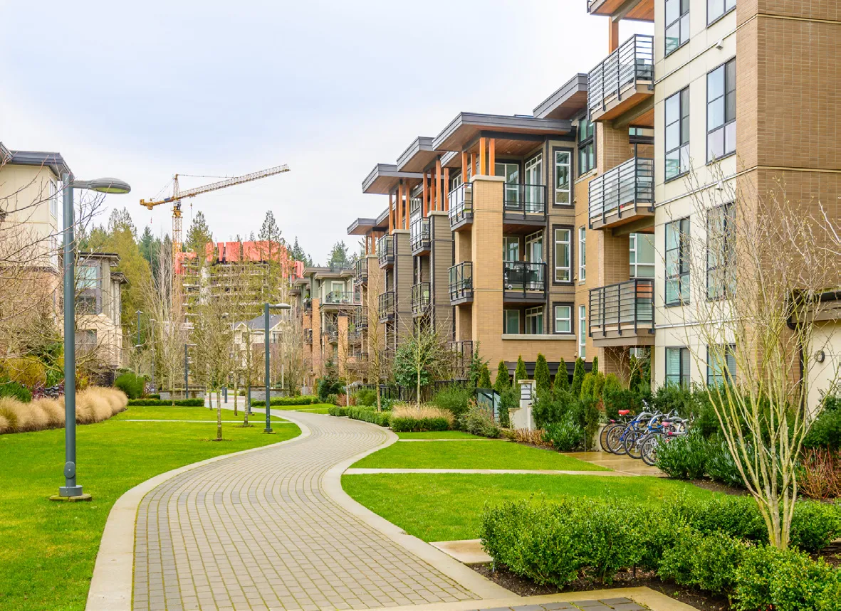 Buildings with dynamic pedestrian frontage and balanced vehicle and pedestrian access.