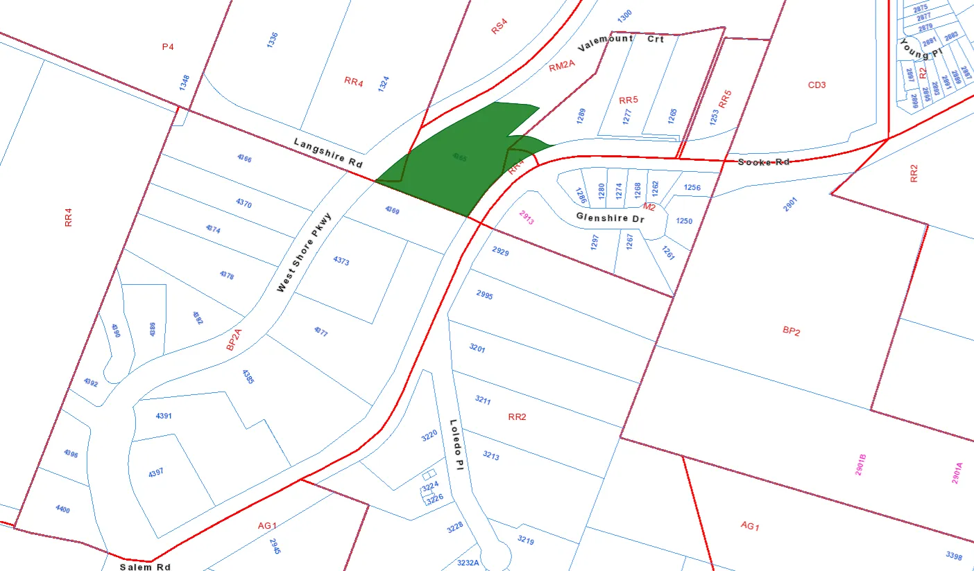 Zoning of properties surrounding the subject property, highlighted in green, with Glenshire Business Park outlined in yellow
