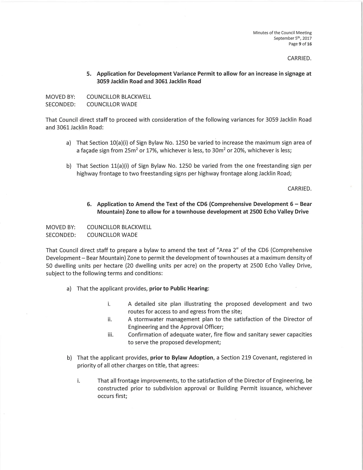 Scan of page 9 (Committee resolutions — signage variance and Bear Mountain CD6 amendment)